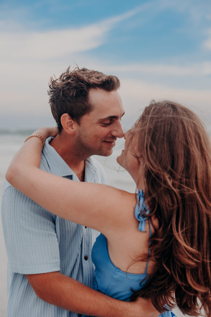 Ryan and Olivia laughing on the beach after getting engaged (24)