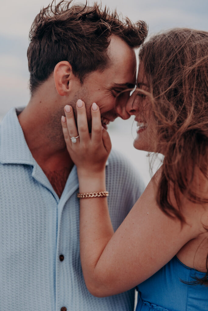 Ryan and Olivia embracing on the beach after the proposal (29)