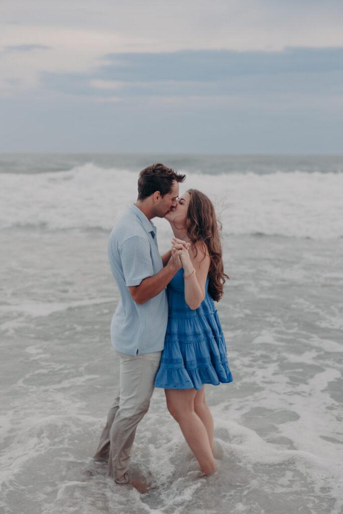 Ryan and Olivia embracing on the beach after the proposal (39)