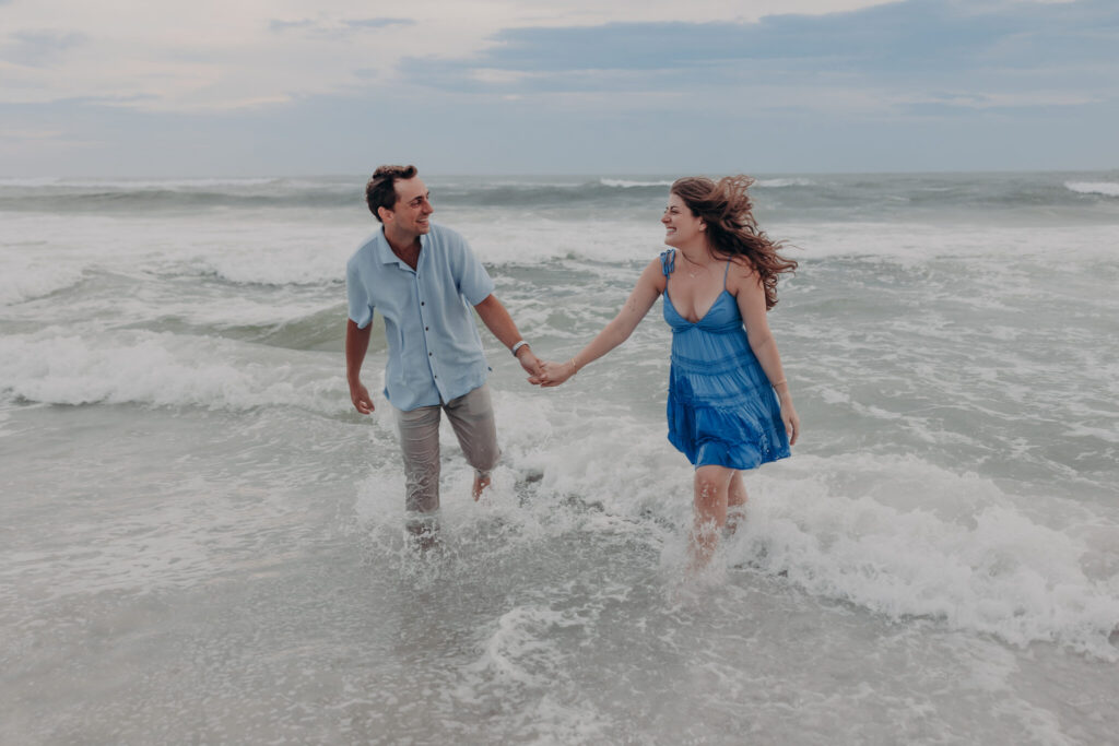 Ryan and Olivia laughing on the beach after getting engaged (44)