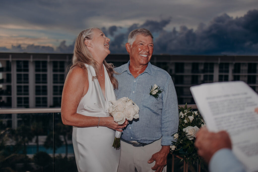 Allison and Jerry exchanging vows on their private balcony (13)