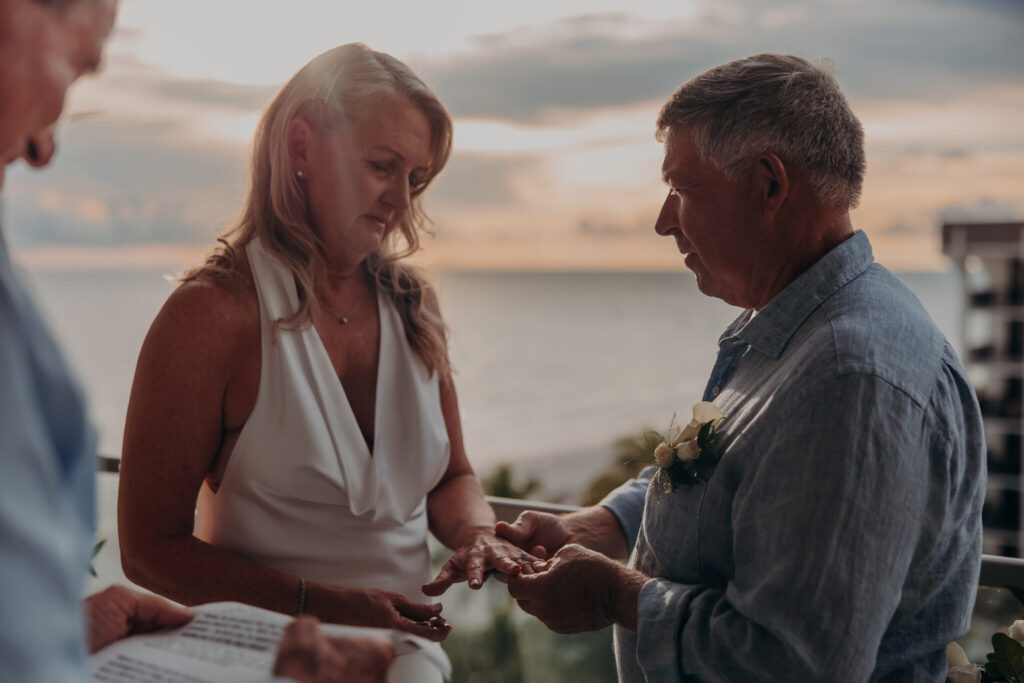 Allison and Jerry embracing on the balcony at St. Regis Longboat Key (19)
