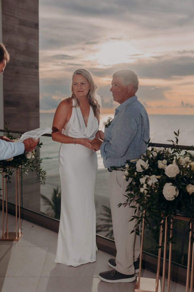Allison and Jerry exchanging vows on their private balcony (23)