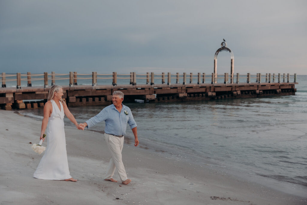 Allison and Jerry embracing on the balcony at St. Regis Longboat Key (39)