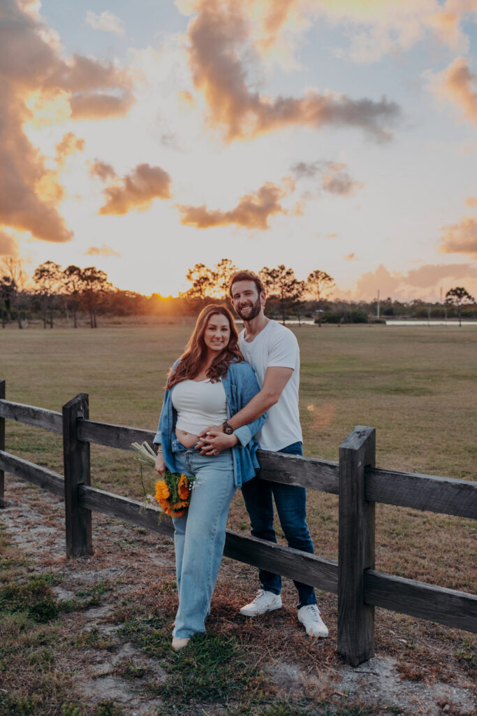 Golden hour pregnancy announcement photos in Ellenton, Florida