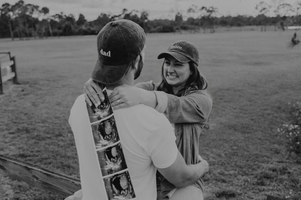 We're having a baby, pregnancy announcement at Tom Bennett Park